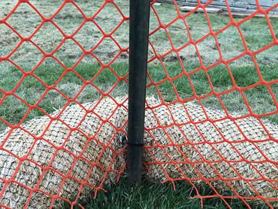 Diamond temporary barrier fence erected by T-posts.