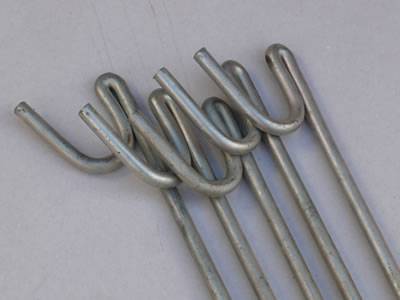 Galvanized barrier fence steel pins for easy erecting of temporary fencing.