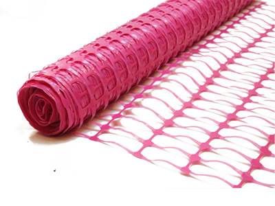 Pink plastic barrier mesh with oval opening.